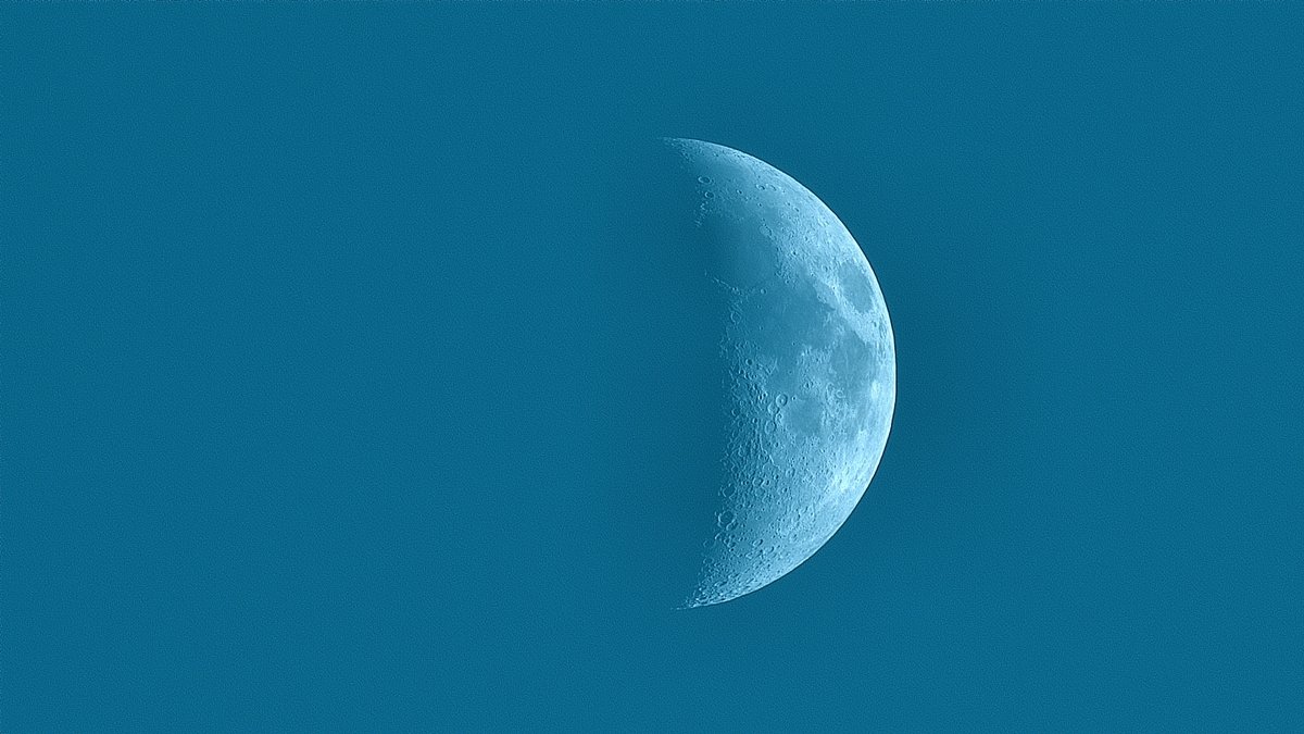 Mid day moon