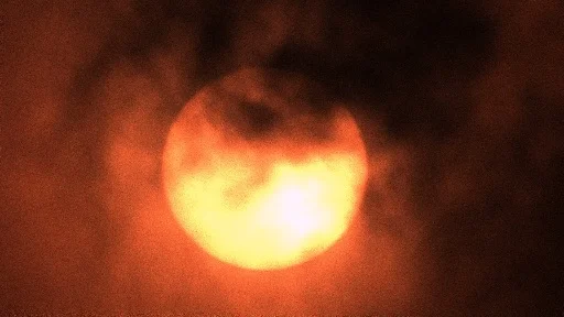 Moon and Sun at Sunrise