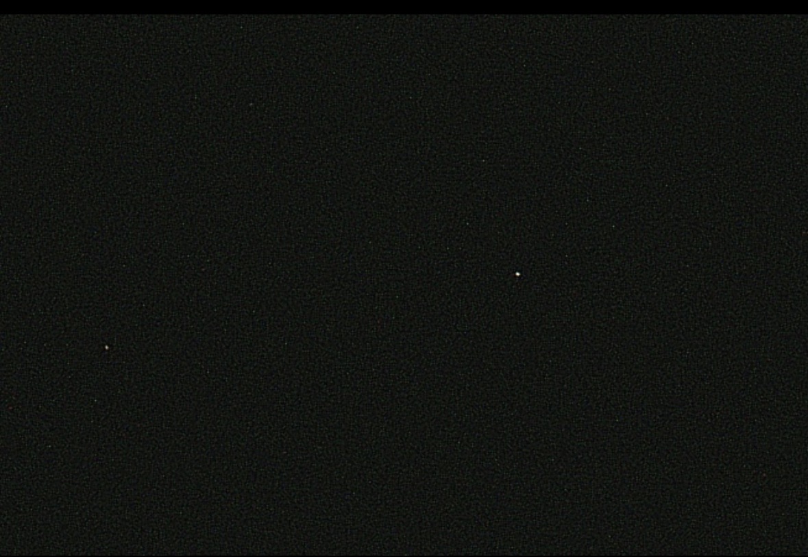 Neptune (r), and its moon Triton (l).